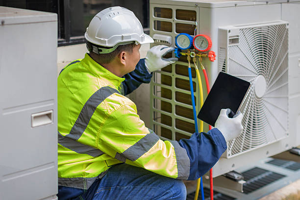 Professional Ductwork Repair technician working in Maynard, MA